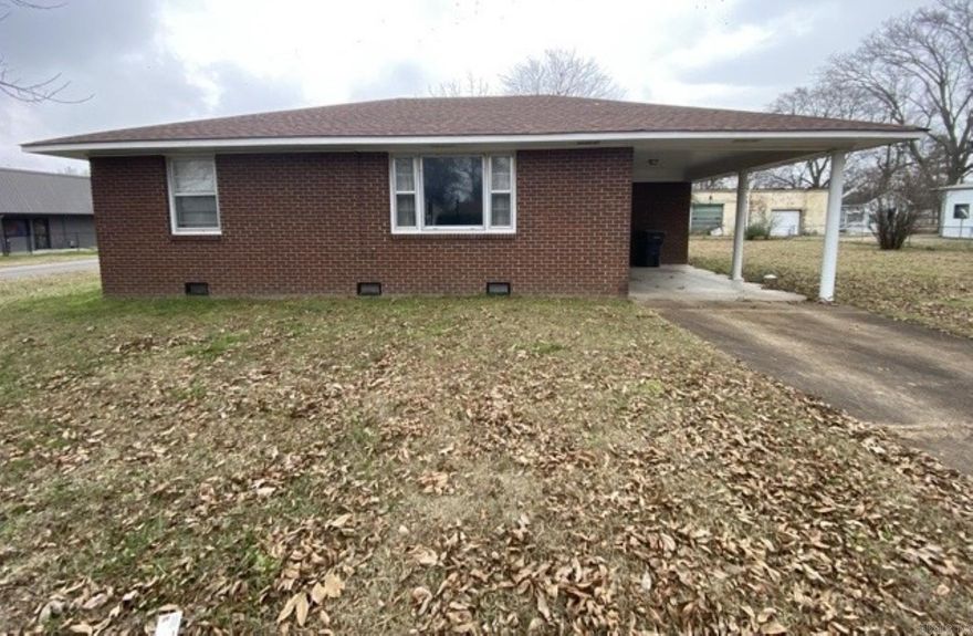This 2 bedroom, 1 bath home awaits with opportunity! It has brick exterior and is located in the town center, in Walnut Ridge School District. Separate laundry room, gas heat and gas water heater. Nice flat, corner lot. Systems are not guaranteed to work. Earnest Money is required. Agents see additional remarks.