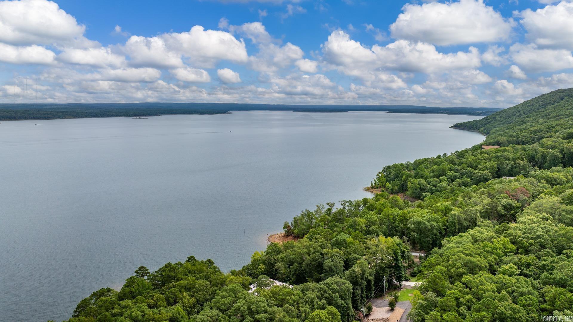 Discover 2.37 acres of pristine lakefront property offering a gently sloping to flat shoreline—perfect for your dream home or weekend retreat. Enjoy breathtaking water views, direct access to the lake, and ample space to build with flexibility. This expansive lot provides the ideal setting for outdoor living and endless recreational possibilities. Don’t miss the chance to own a slice of waterfront paradise with room to grow.