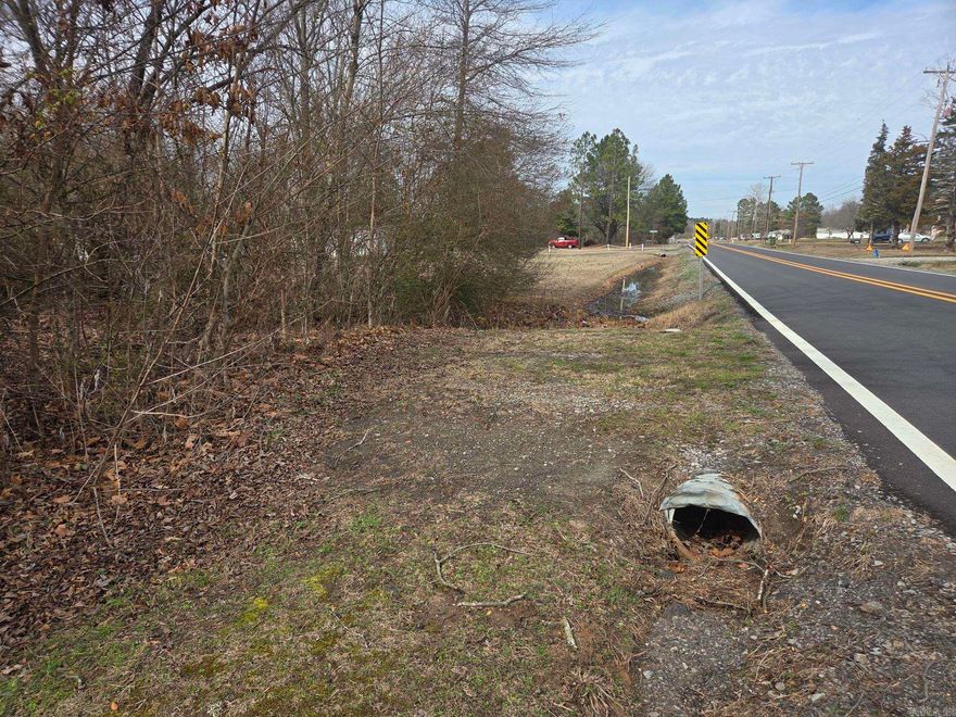 Nice wooded 17 acre +/- rectangle tract of land between Pangburn & Searcy with some road frontage on Hwy 16 just north of 3209 Hwy 16. No restrictions & electric & water are at the road. There is a utility easement running diagonal through the back 1/3 of the tract that would make a good shooting lane. Best of both worlds, having hunting woods in back & clearing for a driveway & house towards the front. Located just North of Mt. Side Dr. & 3209 AR16 on West side of Hwy 16. No mineral rights are available & no seller property disclosure will be available. See agent remarks.