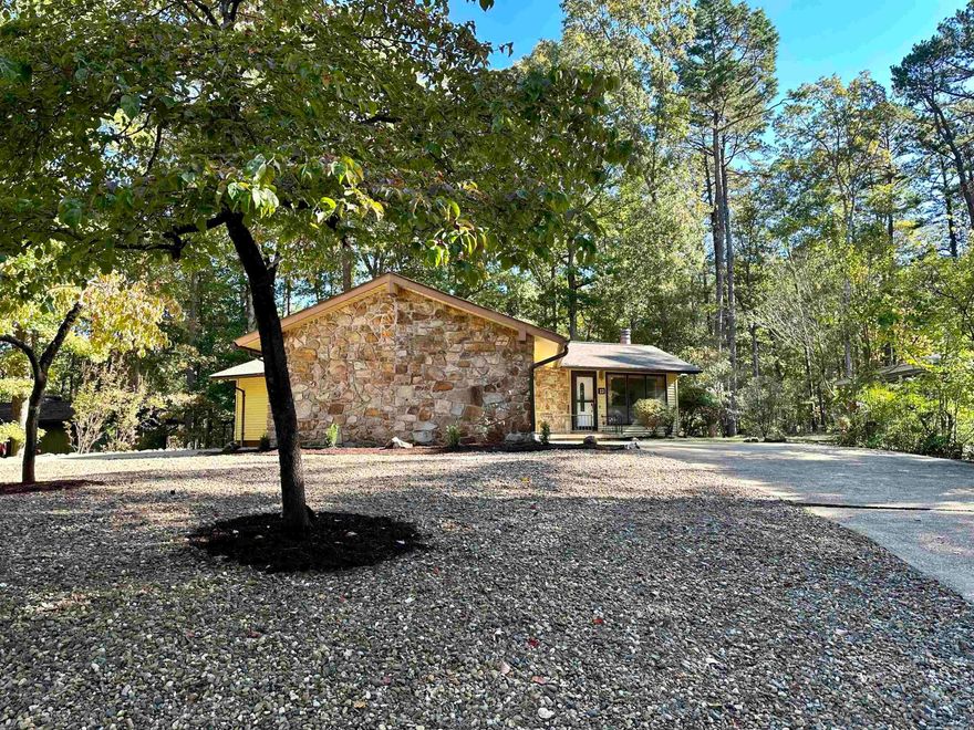 On a safe cul-de-sac, and beautifully situated on a great size lot w/new landscaping & power-washed U-shaped driveway, sits a Cozy Cottage w/ an updated fireplace & lots of natural light in living, dining & kitchen area. Ample storage throughout w/newer fridge, washer & dryer to convey. The screened in porch extends your living area while the insulated large workshop w/window easily serves multiple purposes —  This affordable real property is ideal for either a small family, couple or single individual, for owning or renting, both long or short term.  With low maintenance, this is an ideal investment property! /Welcoming  curb appeal!