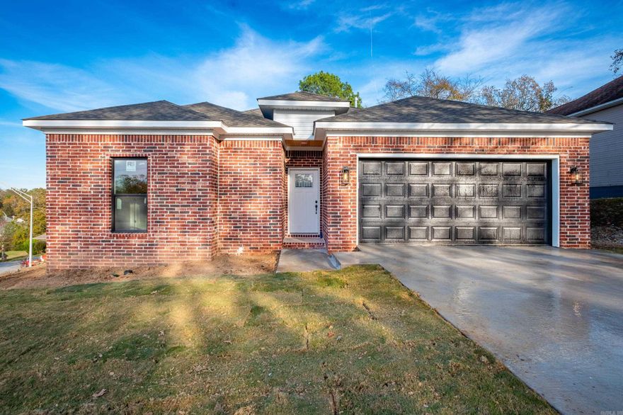 New Construction: This charming home is a most see!!!  On a oversized corner lot with a covered porch, allows the homeowner to make experiences with family and friends.  9' ceilings and the open floor plan. creates easy living for families. Luxury vinyl throughout the home and porcelain tile in bathrooms. Large walk-in closets.  This  home  is in the proximity of shopping, restaurants, schools and access to the freeway.  Builder 1 year warranty.   School District 010 SHER PCSSD