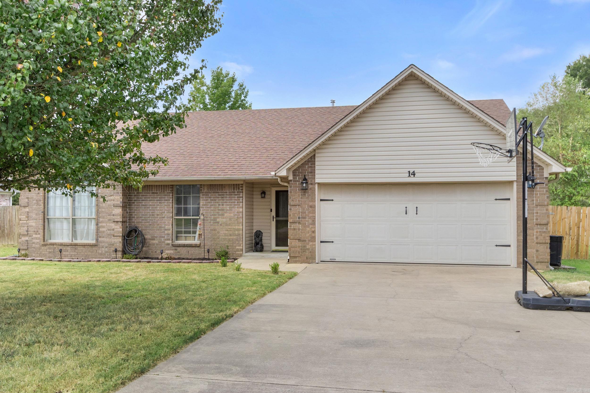 Fantastic centrally located Cabot home - 3BR / 2BA on a great level yard - Move in ready! New architectural shingle roof installed Sept 9th! Granite tile counter tops, stainless appliances, double oven range, breakfast bar, & great pantry in the eat-in kitchen. Awesome great room w/ gas fireplace for the family! Big patio for entertaining and hanging out. You'll enjoy the hand-scraped hardwood floors and vaulted beamed ceilings. Primary bedroom has awesome ensuite with split vanities, jetted tub, split closets, and walk in shower. Fully fenced oversized back yard for the kids and fur babies to run and play. Outstanding, high-ranking schools nearby, from elementary to high school - all less than 1.5 miles away. This home is perfect for you to raise your family! Please see agent Remarks.
