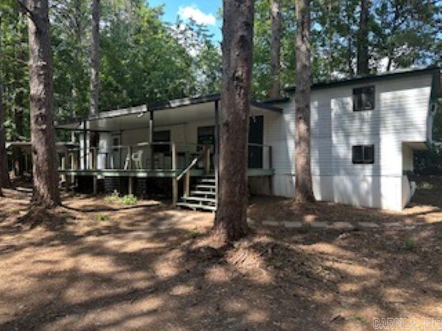 Re-modeled mobile home with nice workshop in wooded area. Property is located in the middle of Greers Ferry close to everything. Also has a nice workshop. Ready for the new owner.