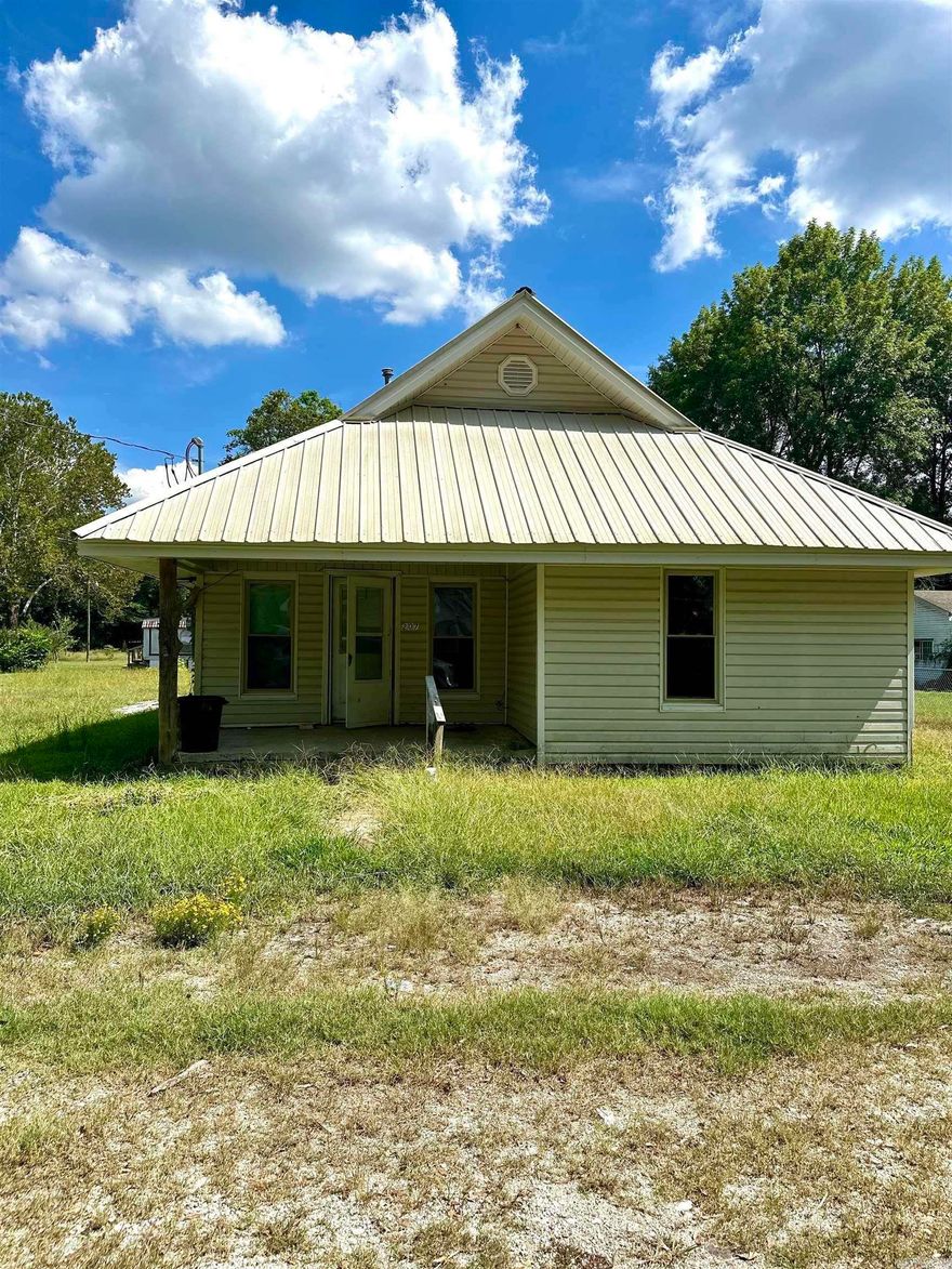 Calling all DIY enthusiasts and savvy investors! We've got a diamond in the rough waiting for your magic touch. This cozy two-bedroom, one-bathroom house is begging for a little TLC and a whole lot of imagination. Picture this: you walk in and see the beginnings of a beautiful renovation. Some materials are already there, just waiting for you to roll up your sleeves and get to work. It's like a half-finished puzzle, and you get to be the one to complete the picture. How's that for a fun project? With 1,008 square feet of potential, this home is your blank canvas. Want to knock down a wall? Go for it! Dreaming of a farmhouse sink? Why not? The possibilities are as endless as your Pinterest boards. One thing you won't have to worry about is the roof. This place is sporting a sturdy metal topper, so you can focus on making the inside as fabulous as you've always dreamed. Located in a quiet neighborhood, this home is just a short drive from Ouachita High School. Perfect for families or investors looking to tap into the rental market. So, whether you're looking for a project to sink your teeth into or a smart investment opportunity, this fixer-upper might just be your ticket!