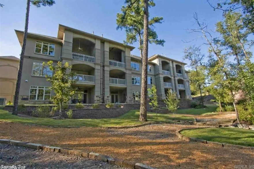 Light-filled upstairs end unit with hardwoods, top of the line appliances, covered veranda overlooking putting green, pool and greenspace. 2BR, 2BA down, 1 BR & BA up. Walk in closets, vaulted ceiling in greatroom which opens to kitchen/dining area.. Outside storage and a garage. Elevator just outside the front door.