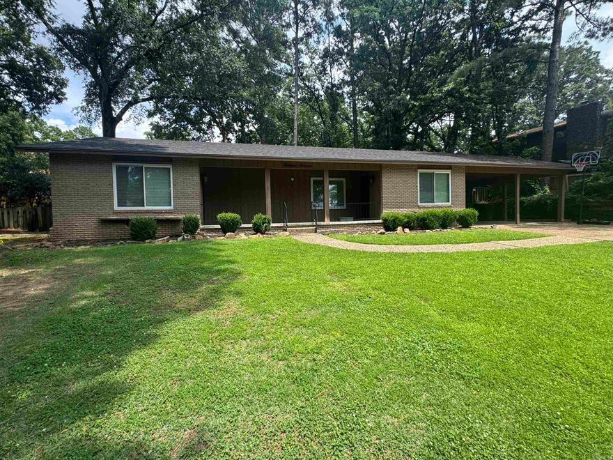 Beautifully updated home in desirable Park Hill! Sits on a spacious +/- 3rd acre lot shaded by mature trees enhanced by attractive landscaping. Inside, you'll find beautiful hardwood floors, two living areas, large fireplace, built-in bookshelves, an updated kitchen, updated primary bathroom, a large laundry room, and abundant storage throughout. Enjoy relaxing on the covered front porch or entertaining on the private, shaded backyard patio. The lush Zoysia lawn is supported by a sprinkler system, and the quality site-built shed provides excellent space for a workshop, craft room, hobby area, or man cave. Major improvements include an architectural shingle roof installed just two years ago and a newer driveway. Located on a quiet, low-traffic street with convenient access to shopping, dining, downtown and interstate. This move-in ready home offers the perfect combination of privacy, comfort and convenience. **Agents See Remarks**