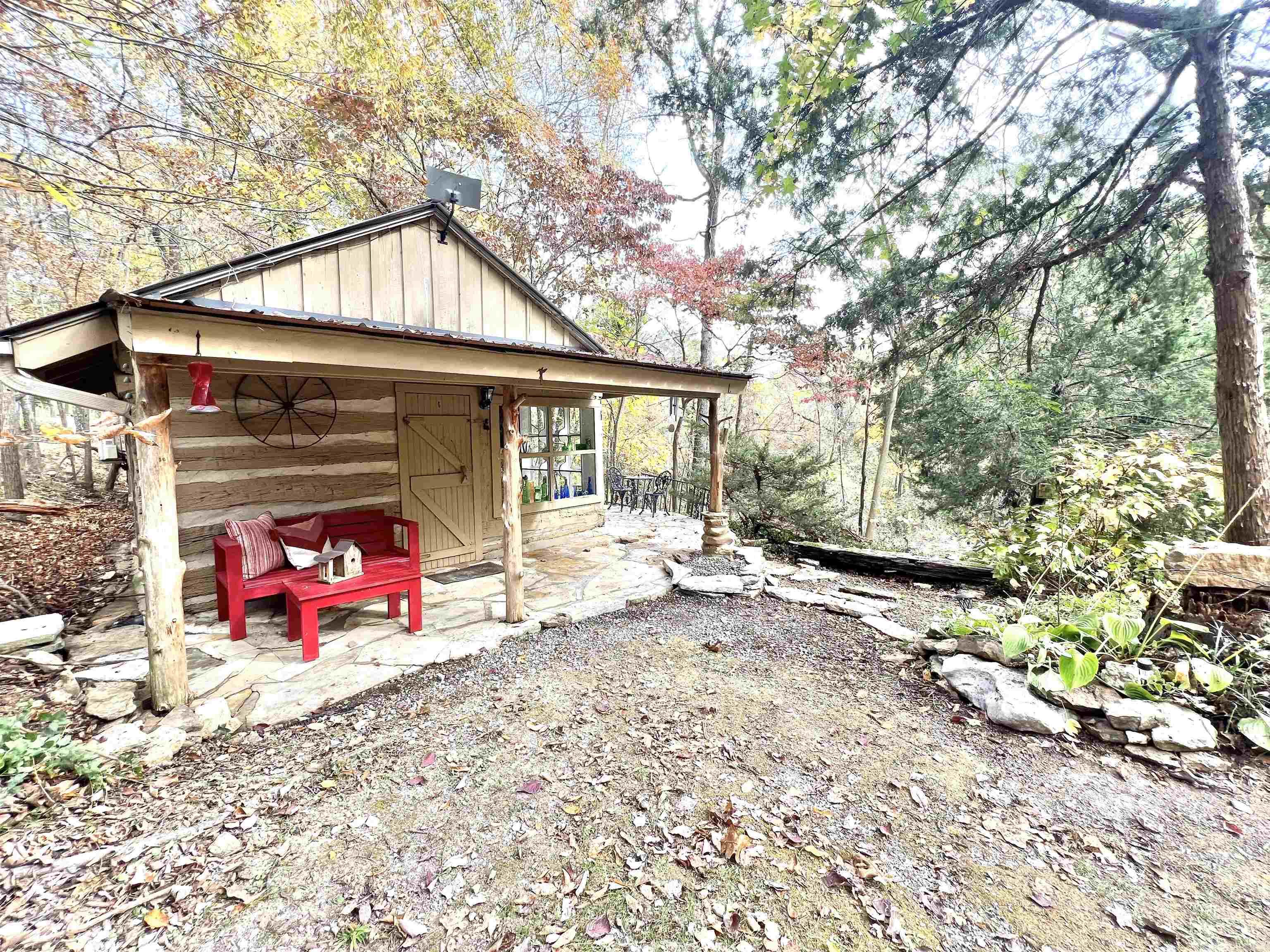 Built from a Pre-Civil War log cabin, this home was once the original Arkansas Craft Guild. Located just outside of Mountain View and only minutes from the famous White River, this unique cabin is turnkey with updated plumbing and electrical and ready to be the perfect vacation rental or your own Ozark homestead!! Don't miss out on this amazing opportunity to own a piece of history!!