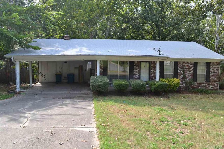 Affordable home located near shopping, schools and churches.  Offers a formal living room plus a large den.  Updated tile in kitchen.  Wall oven and electric cooktop.  Large breakfast bar.  Three big bedrooms have carpet.  Baths have vintage tile work that's beautiful. Guest bath has tub/shower combination with glass door.  Master bath has tile shower.  Large backyard is fenced and private.  Add your own touches to make this house your home at a great price!