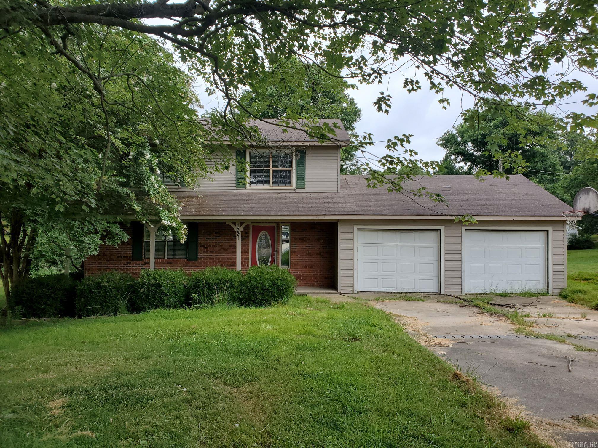 1391 Wiley Dr. Piggott, AR. 72454 3BR, 2BA, 1440SF, 0.49 acres,