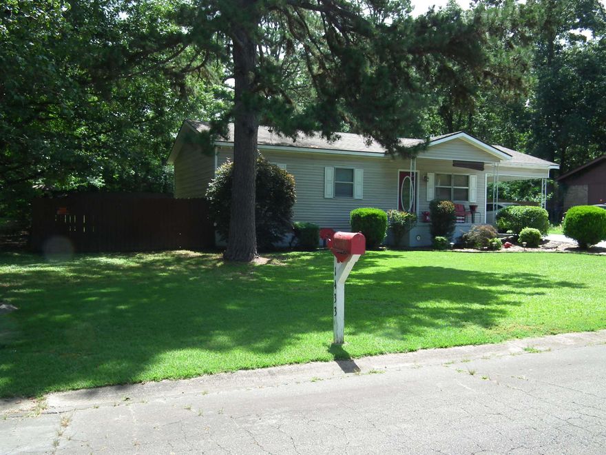 Great house in a good location.  Three bedrooms and one bath. Open living/kitchen area. Razorback bath !! New floor coverings in bedrooms. Seller is painting inside. Wonderful street appeal.  Fenced back yard. Low maintenance exterior.
