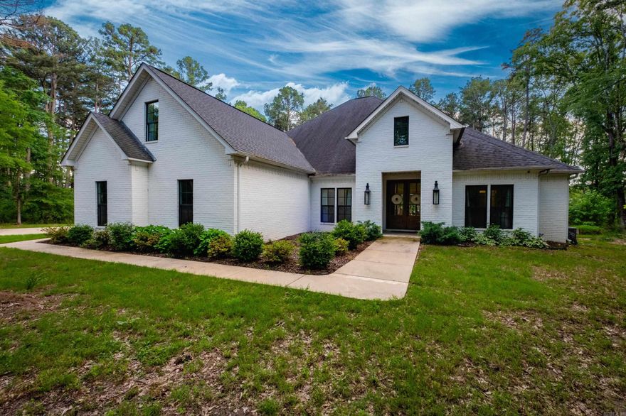 Beautiful newer-build modern farmhouse available for rent in Alexander! This spacious 5-bedroom, 4-bath home features an open-concept layout, stylish finishes, and plenty of natural light. Enjoy a gourmet kitchen, cozy living area, and a luxurious primary suite. The backyard is perfect for relaxing or entertaining, with a sparkling pool and covered patio. Located in a quiet neighborhood with easy access to Benton, Bryant, and Little Rock.  Don't miss this stunning rental—schedule a tour today!