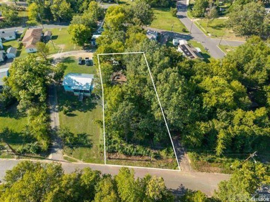 Lots 62, 63, and 64 on John St. Land only.