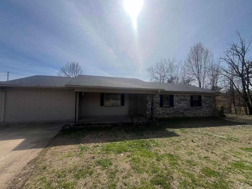 Nice cozy brick Home on a really nice Lot in the Mena city limits.  The Home has 3 bedrooms and 2 &1/2 Baths. This Home sits on approximately 1/2 acre!  Lots of room for your yard with this property! New Flooring has been installed as well as other updates to the inside of the House!  New Roof has also been applied!