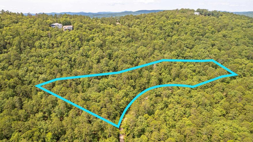 Don't Miss This Amazing Property! It is rare to find over 5 acres for sale in beautiful Hot Springs Village. If you are looking for land to build your dream home, this remote property has stunning views and gorgeous terrain with natural stones.   Hot Springs Village spans over 26,000 acres of the Ouachita Mountains, has 11 lakes and 9 golf courses along with over 200 social clubs. Come enjoy being apart of this great community!