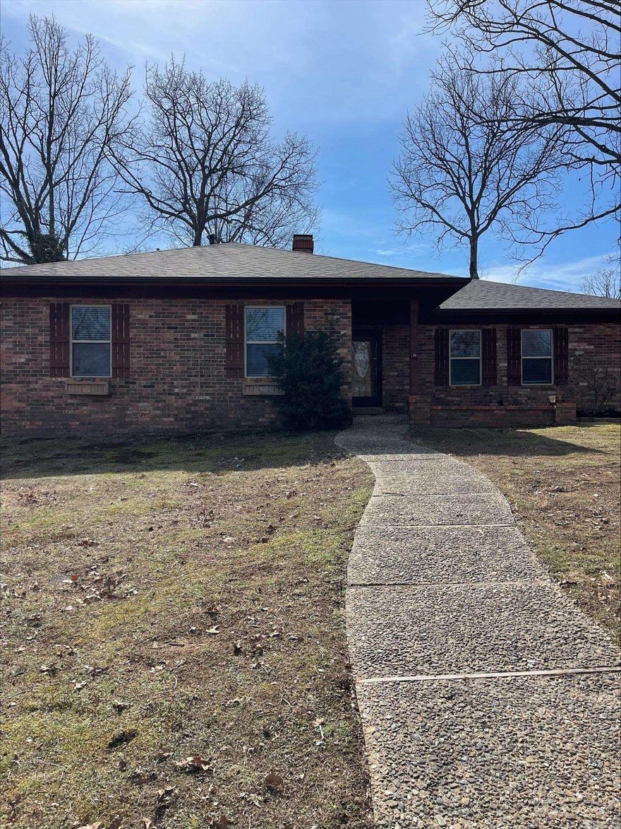 Newly remodeled brick home on a corner lot, with very low traffic street. Large fenced backyard, with a small storage building & large deck for entertaining. Side load garage & cover patio out front. New gas range, butcher block countertops, pantry, new garbage disposal, fridge stays, separate dining room, & waterproof laminate throughout the home. The living room has a large picture window & site built fireplace. Master has a large walk-in closet & walk-in shower. Brand new architectural shingles roof.