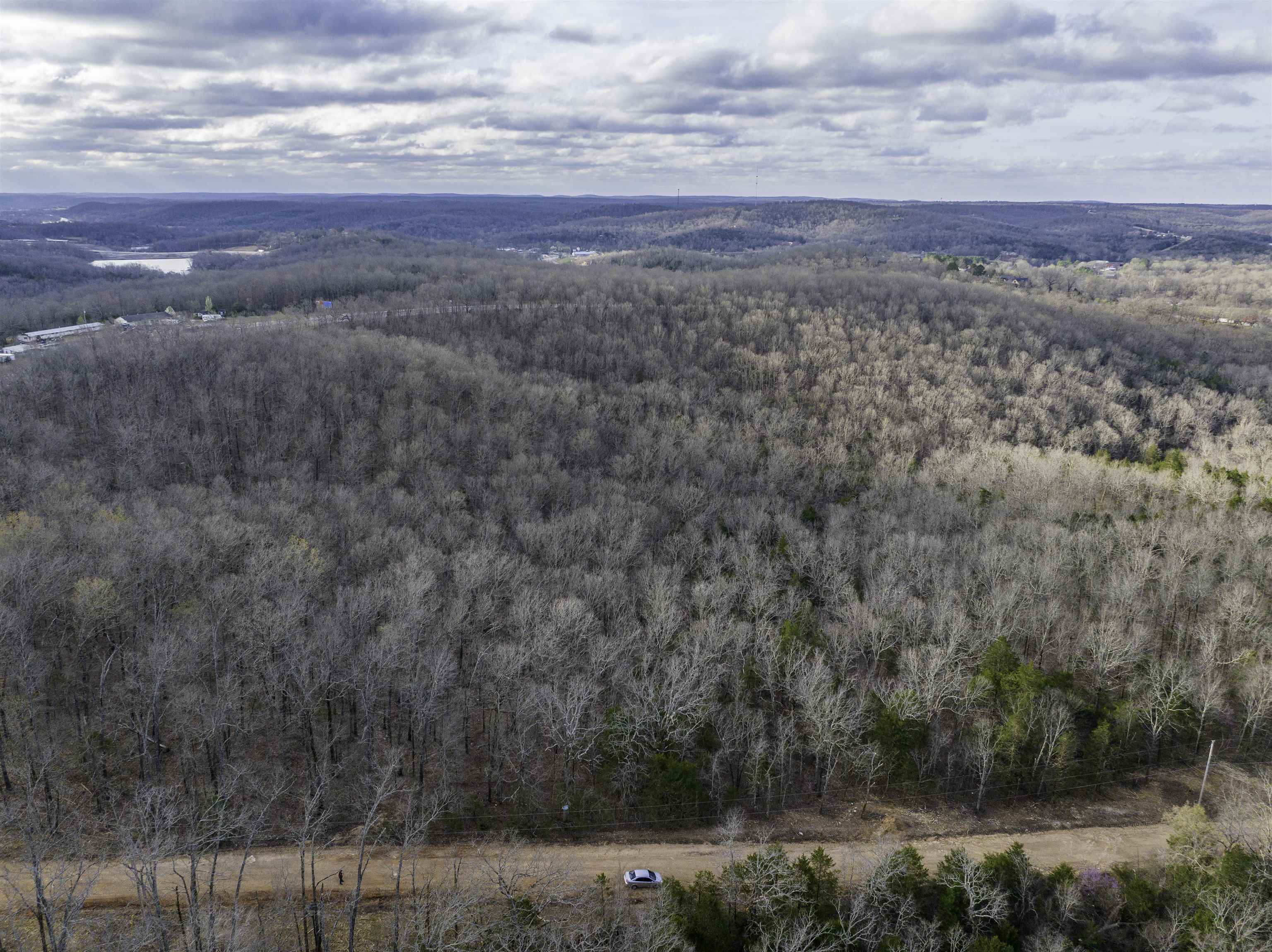 Wooded 3.12 acre tract in Hardy Arkansas, Your Ozark retreat awaits! Discover the perfect blend of tranquility and adventure with this stunning 3.12-acre property nestled in the heart of the Ozarks. Located in Hardy, Arkansas, this picturesque land offers a rare opportunity to own a piece of unspoiled natural beauty. Surrounded by rolling hills, mature hardwoods, and the peaceful sounds of nature, this property is ideal for those seeking a private getaway, a future homesite, or an investment in land. Whether youāre looking to build a cozy cabin or a dream home, this property provides endless possibilities. (Please note: RVs & Mobiles are not permitted.) Property Highlights: ⢠Size: 3.12 acres of pristine land ⢠Location: Hardy, AR ā a charming town known for its rich history, scenic beauty, and access to the Spring River ⢠Terrain: Gently rolling with a mix of open space and wooded areas ⢠Access: Easy road access for year-round enjoyment ⢠Utilities: Power nearby, well and septic may be needed ⢠Outdoor Recreation: Close to Spring River for fishing, kayaking, and floating, plus hiking and hunting opportunities in the surrounding Ozarks. All at an affordable price