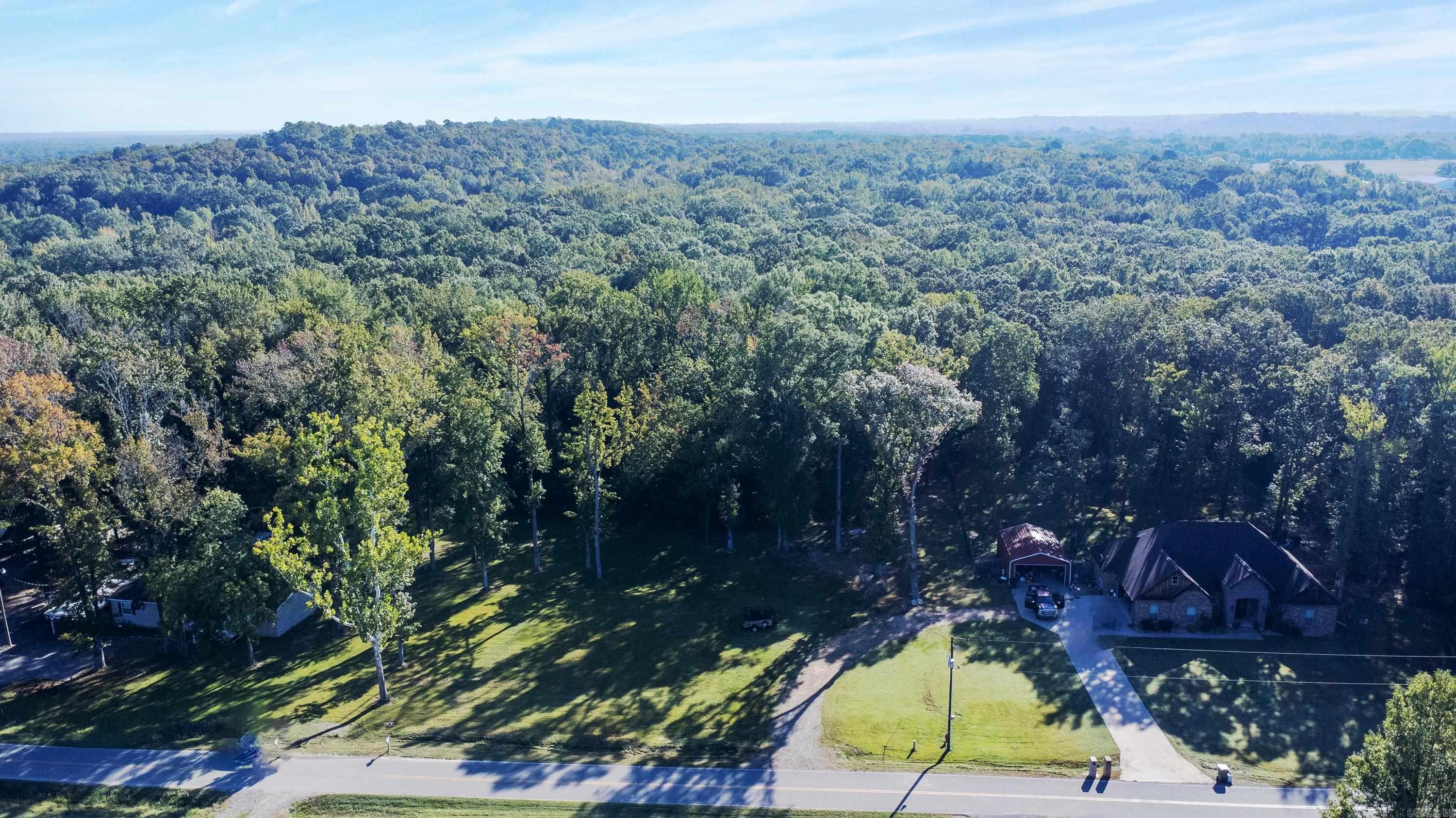 Explore the possibilities with this opportunity to own two side-by-side residential lots, totaling approximately 5.5 acres. The perfect setting to build your dream home, where you can enjoy the tranquility of nature while staying close to modern conveniences.