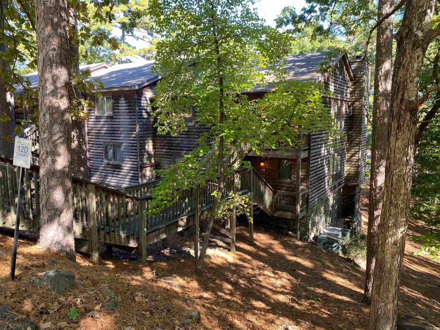 Looking for a condo on Lake Ouachita?  This 2 bedroom, 2 bath unit has approx. 1,128 sq ft and is fully furnished.  Located near the Turtle Cove Spa and swimming pool and overflow parking is across the street for those unexpected guests.  The owners have priced this below the current comp's to leave room for you to make any updates you might or might not want.  HVAC was replaced in 2024.  If you have been dreaming of your very own lake place at Mountain Harbor or looking for an investment property don't miss out on this one.  Call today for your private showing.