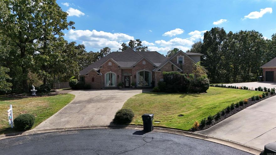 Welcome to Your Dream Home in the Prestigious Gated Stonegate Subdivision! Experience the perfect blend of comfort, style, and scenic beauty in this fully updated home, nestled in the sought-after Stonegate community. Enjoy stunning views of Mt. Riante and Lake Hamilton right from your front windows, while basking in the tranquility of this beautifully maintained neighborhood. This spacious home features engineered hardwood floors, granite countertops, new sinks, toilets, light fixtures and heated floors in the main bathroom. The open- concept kitchen seamlessly connects to the cozy living room and breakfast nook—perfect for everyday living and entertaining. A wall of windows floods the living area with natural light and showcases breathtaking mountain views. There is a dining room, a versatile media room or home office, a detached office or in- law suite. At the end of a long day, you can enjoy the expansive back deck with privacy. Don’t miss your opportunity to own this exceptional property that offers both luxury and functionality in one of the area’s most desirable gated communities.  Additional lot included outside of gated backyard to iron fence.