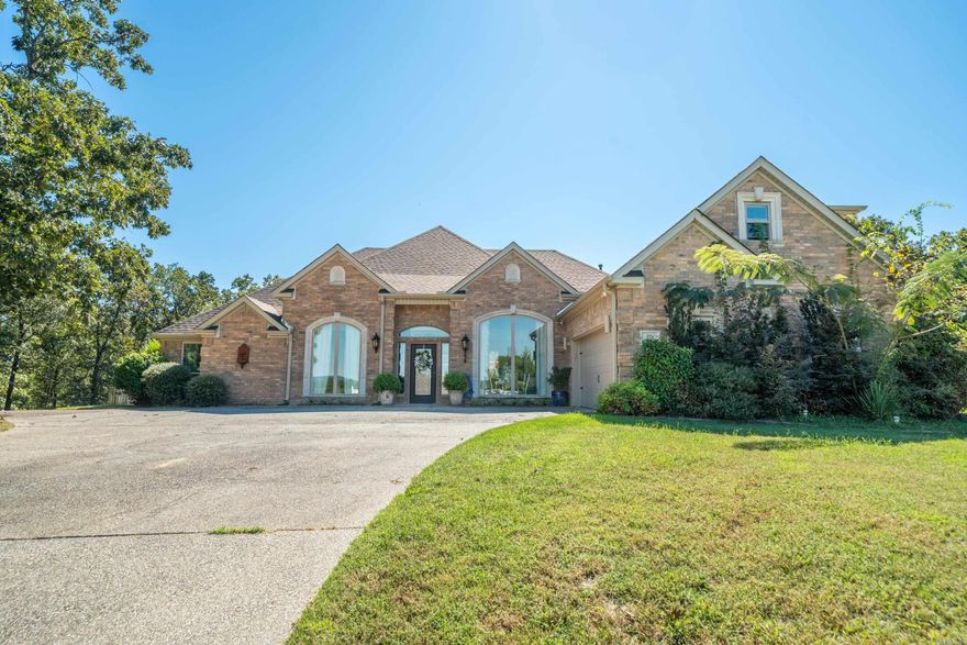 Welcome to Your Dream Home in the Prestigious Gated Stonegate Subdivision! Experience the perfect blend of comfort, style, and scenic beauty in this fully updated home, nestled in the sought-after Stonegate community. Enjoy stunning views of Mt. Riante and Lake Hamilton right from your front windows, while basking in the tranquility of this beautifully maintained neighborhood. This spacious home features engineered hardwood floors, granite countertops, new sinks, toilets, light fixtures and heated floors in the main bathroom. The open- concept kitchen seamlessly connects to the cozy living room and breakfast nook—perfect for everyday living and entertaining. A wall of windows floods the living area with natural light and showcases breathtaking mountain views. There is a dining room, a versatile media room or home office, a detached office or in- law suite. At the end of a long day, you can enjoy the expansive back deck with privacy. Don’t miss your opportunity to own this exceptional property that offers both luxury and functionality in one of the area’s most desirable gated communities.  Additional lot included outside of gated backyard to iron fence.