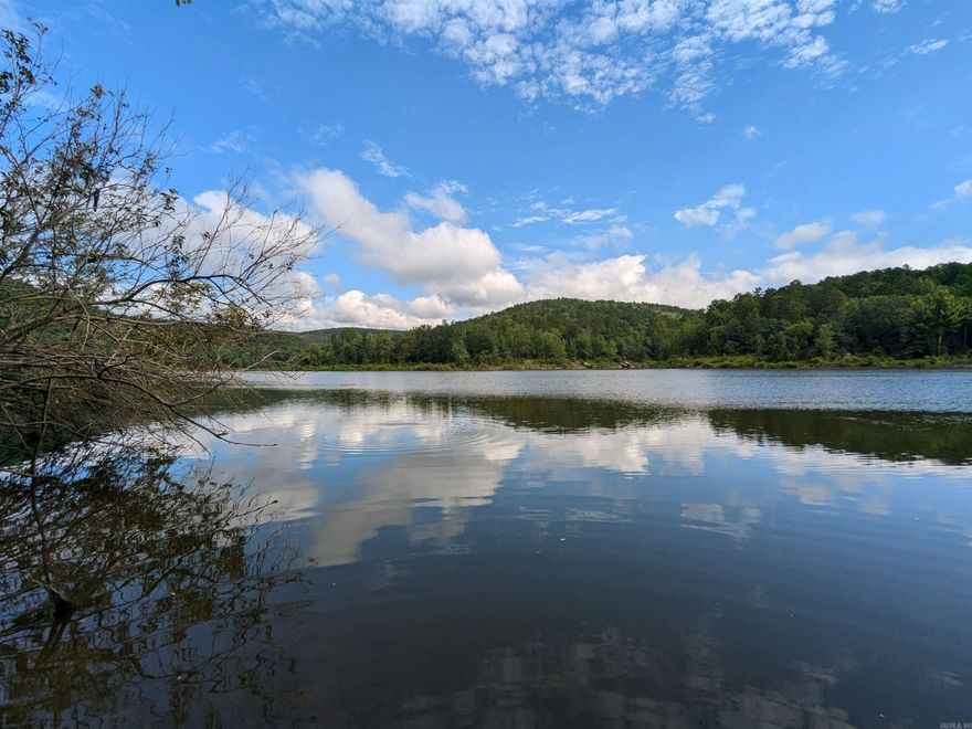 25.82 Acres Bordering Greers Ferry Lake | Over 1,500 Feet of Lakefrontage | No Restrictions   Rare opportunity to own 25.82 surveyed acres with approximately 1,508 feet of lake frontage on beautiful Greers Ferry Lake. This private, gated property offers excellent seclusion with mature hardwoods, a lovely forest setting, and a winding trail that stretches the length of the property.   Enjoy abundant wildlife including deer, excellent fishing, and seasonal wet-weather streams with small waterfalls. A boat slip is conveniently located less than one mile from the property gate, and electricity is available nearby at the road. No restrictions, giving you the freedom to build, camp, hunt, or develop as you wish.   Whether you're looking to create a private retreat, hunting getaway, or future lakefront home, this unique property combines privacy, natural beauty, and direct access to one of the most desirable lakes in Arkansas.   GPS Coordinates: 35.63555, -92.21164