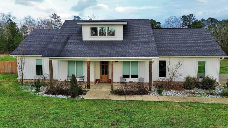 Awesome modern custom home on 13 beautiful acres in the Glen Rose area, built by Schrader Homes. This stunning property features 3 bedrooms, 2½ baths, and 2,289 sq ft with quality craftsmanship and great amenities inside and out. Step inside to find high ceilings and an impressive 8' entry door creating a spacious, open feel. The kitchen features granite countertops, double ovens, and plenty of space for cooking and entertaining. The primary suite includes a beautiful tile shower along with stylish fixtures throughout the home. Complete with a built in safe room. Outside you’ll find the perfect setup for relaxing or entertaining with a heated in-ground pool and an outdoor living area featuring a brick fireplace with a built-in pizza oven. The 13 acres also include a nice pond, adding to the peaceful setting. Need space for hobbies or storage? The property includes a 40' x 60' Red Iron shop with electricity, an additional 16' x 40' lean-to, and a separate camper shed. A concrete driveway and well-maintained grounds complete this incredible property. If you're looking for a beautiful custom home with acreage, pond, pool, and shop space in the Glen Rose area, this is the one!