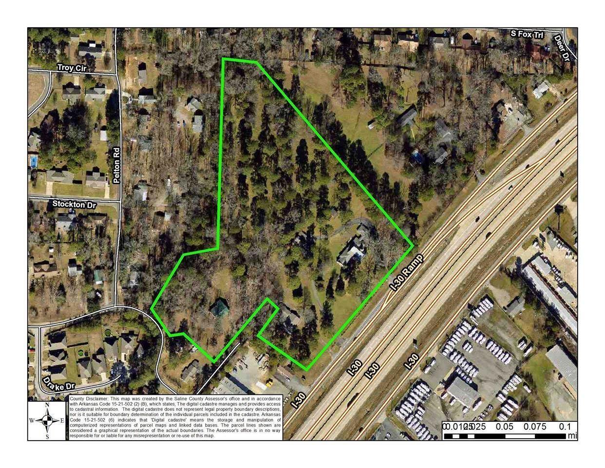 Over 12 Acres on I-30 in booming Saline County. Great visibility with multiple access points. Current structures on property include homes and out buildings. Zoned C3. All utilities available. Survey online for reference purposes only. Call list agent for more details.