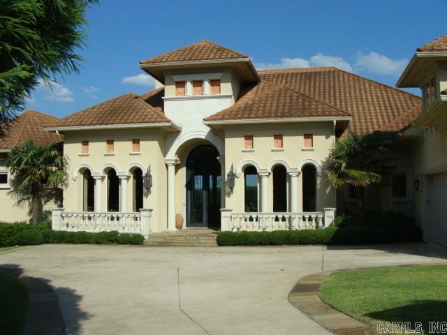 Custom built Meditteranean Gorgeous Estate Home in Red Oak Ridge! Breathtaking water & Vista views from the wall of glass encompassing all of the main living area from the enhanced family - living area floor open plan including the family room, fourmet kitchen, office and dining areas to the master bedroom with spectacular sunrises! This incredible home features italian travertine marble, gorgeous hardwood, extensive landscaping including fountain, koi pond, fruit trees, etc. Phenomenal throughout! ENJOY!