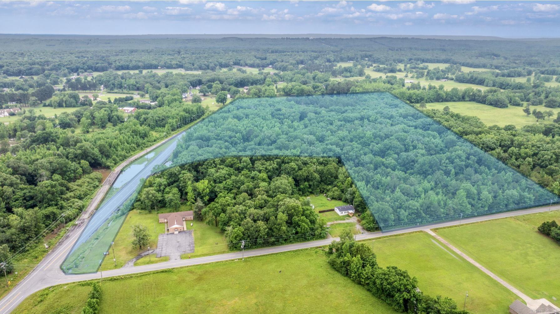 29.40 Acres in Pulaski County – Priced to Sell! Don’t miss this incredible opportunity to own 29.40 acres of beautiful, wooded land in Pulaski County! Perfectly positioned with frontage on Frenchman Mountain Road and Batesville Pike Road, this property offers quick access to AR-89 and Highway 107—making it ideal for a private estate, recreational retreat, or future development. Lush timber surrounds the property, offering both privacy and natural beauty, while Leopard Creek winds through the land, adding to its charm and character. Whether you're looking to build, explore, or invest, this versatile parcel offers endless potential at a price that can’t be beat. Come walk the land, feel the serenity, and envision the possibilities. This is your chance to own a slice of Arkansas paradise—act fast before it’s gone!