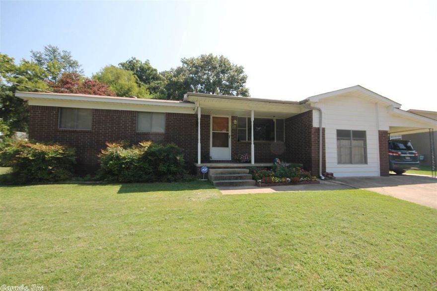 Don't miss out on this adorable home in the heart of Benton! Original hardwoods, eat in kitchen, sunroom, bonus room, move-in ready. New roof and HVAC in 2012. Above ground pool is 2 years old. Storage buildings behind home. Deck and covered patio. Minutes from schools, parks, etc. Will be sold as-is.