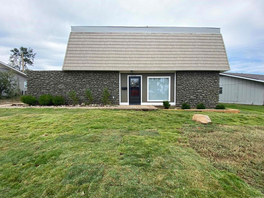 You have to admit.. this home is unique on the outside. It's just bursting with personality, isn't it!  The roof line and the rock exterior definitely make it stand out. But you'll have peace of mind in knowing that all major upgrades have been done! This 4 bedroom 2.5 bath home with an office has had major upgrades in the the past 2 years. New roof, new appliances, new HVAC, new flooring, new paint.. and mother nature cleared of most of the trees! The home has a fireplace, a partially fenced back yard, and a covered carport located in the back of the house. It's on a dead end street, close to shopping and the interstate.