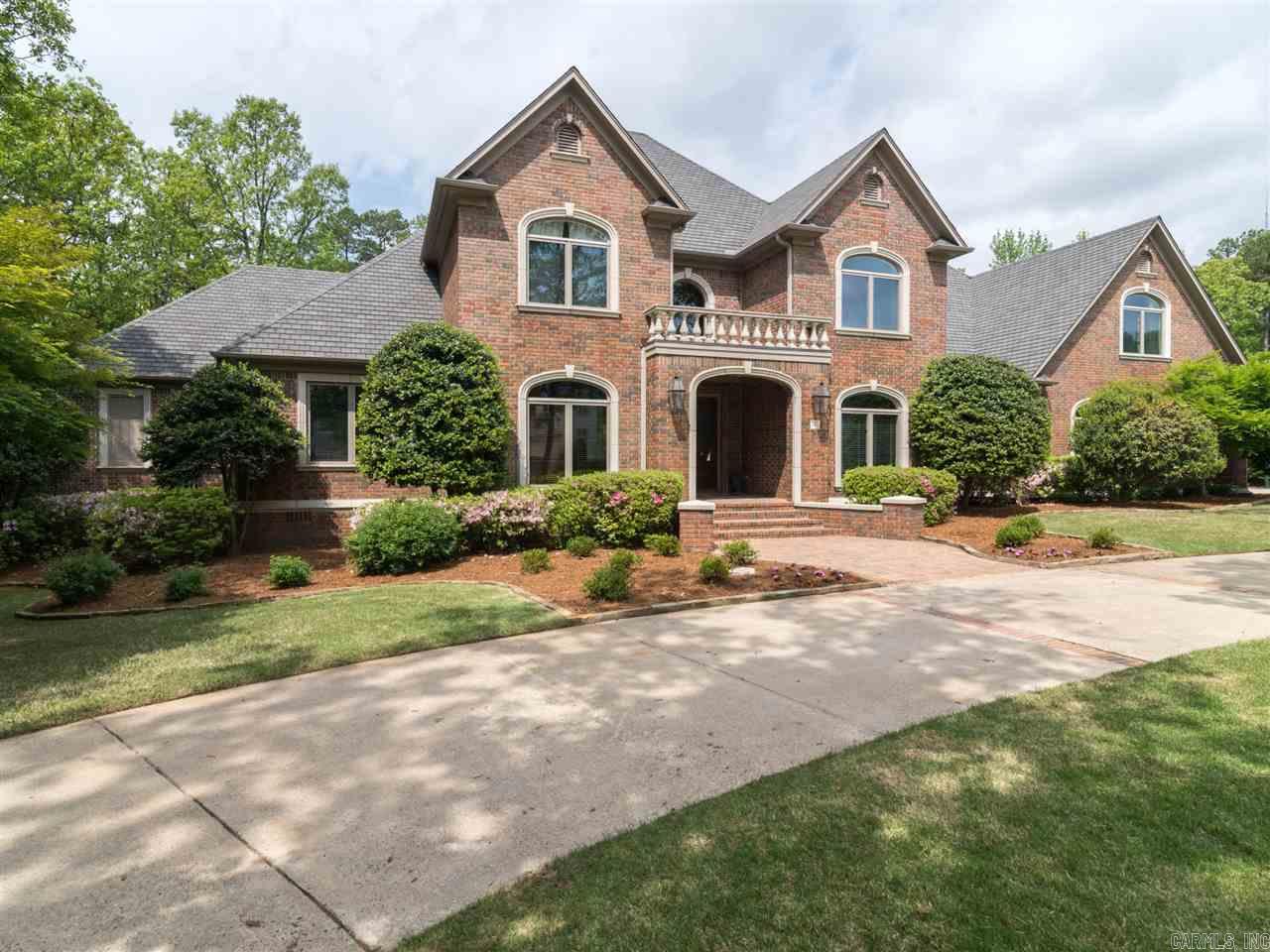 Stunning custom built 2-story located in the coveted Sologne Circle Neighborhood! This home features 2-story foyer leading into a lge 2-story grt/rm w/fp, gourmet kit. w/brfk bar. hearth rm. w/fp, beamed off. w/built-ins, formal dining, butlers pantry, master suite & guest suite on main level. 4 brms, 4 bas & gamerm/media rm. w/wet bar upstairs. Additional features are covered patio overlooking beautifully landscaped yard w/waterfall, screened in porch, circular dr. & triple garage! Backs up to a greenbelt!