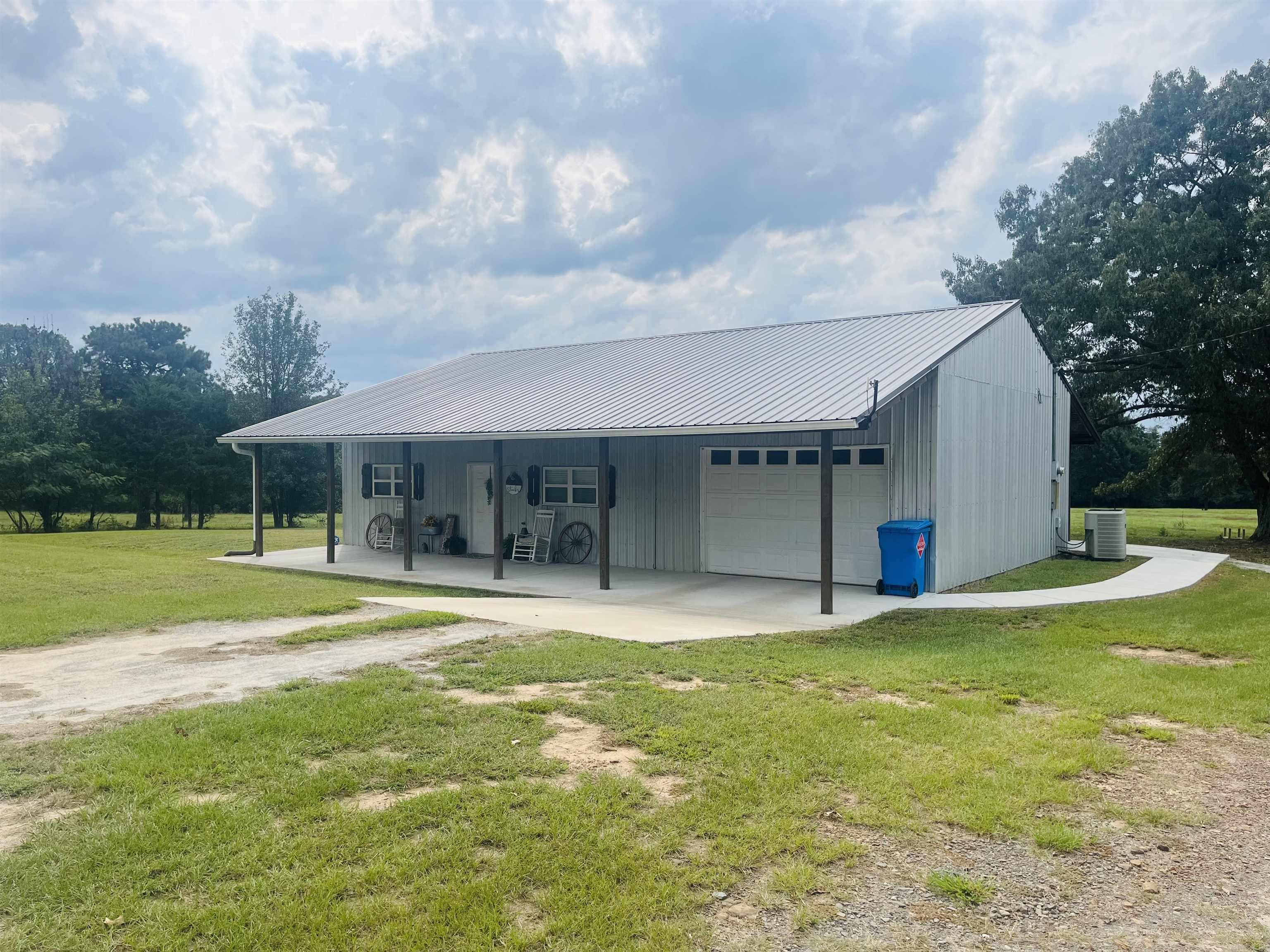 This rural residence is perfect for a variety of demographics. Surrounded by a beautiful acreage, this sturdily built home is ready for occupancy. Versatile in its possibilities, this beautiful home and acreage has potential, amazing location, and true privacy, yet it is in within close proximity to area towns and employers.