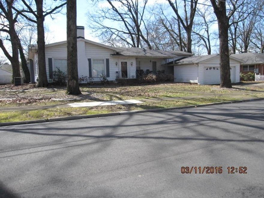 Charming old home with character and ambiance. Beautiful shade trees and extra lot. Some repairs need to be done but was occupied until November 2014. Large rooms - great for entertaining. 21 x 14 shop.