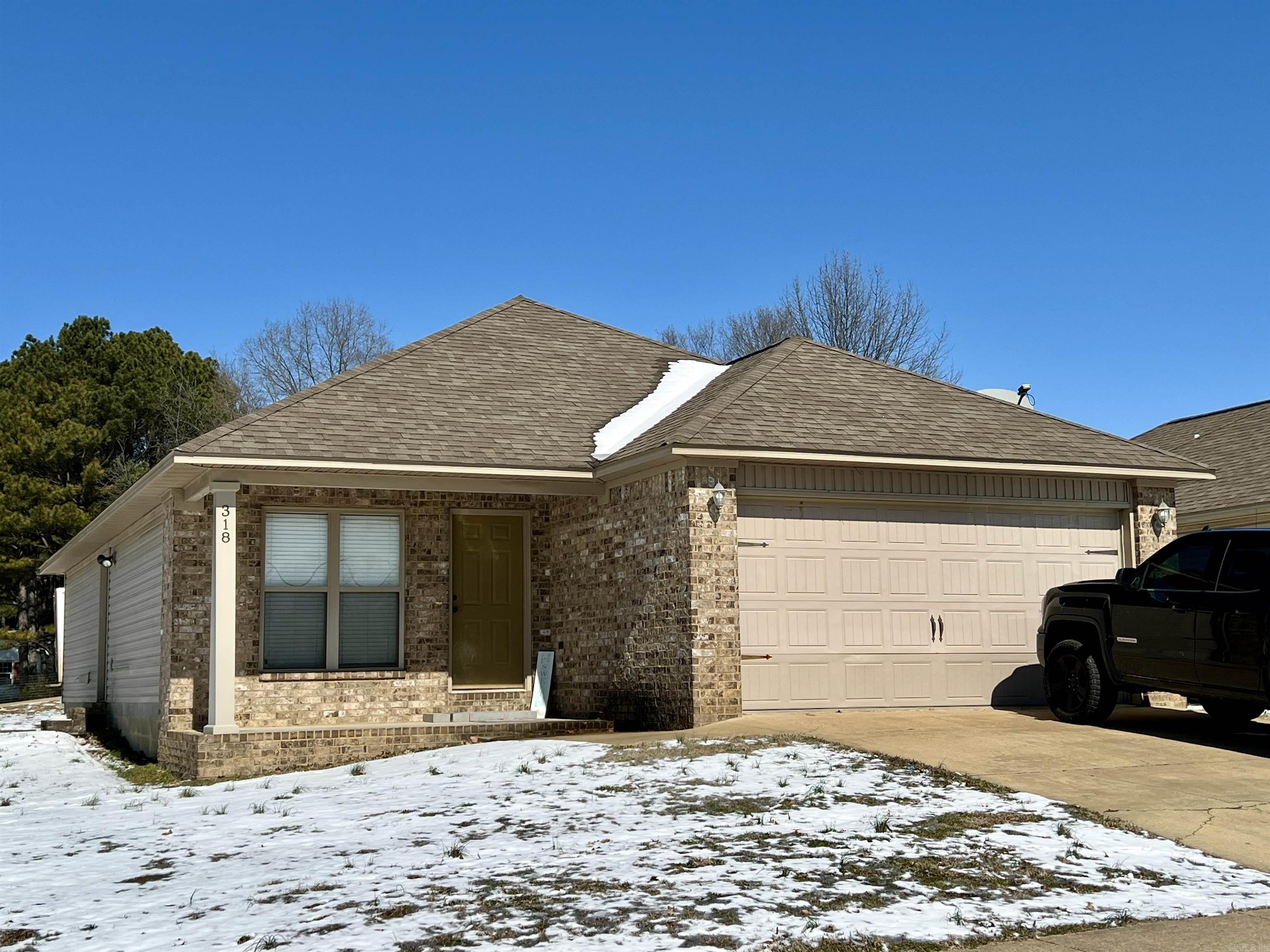 Welcome to this stunning 3-bedroom, 2-bathroom home in the highly sought-after School Ridge Addition of Brookland, Arkansas! With 1,228 square feet of living space, this all-electric home combines modern comfort with stylish features, including beautiful acid-stained flooring that adds a unique touch to the interior. The open floor plan creates a seamless flow between the living, dining, and kitchen areas, perfect for both everyday living and entertaining. The home also features a spacious 2-car garage, providing plenty of storage and convenience. Situated on a 0.12-acre lot, the property offers a manageable outdoor space ideal for relaxing or hosting small gatherings. Located within the award-winning Brookland School District, this home is perfect for families or anyone looking to enjoy a peaceful community with easy access to schools and local amenities. Don't miss your chance to own this charming home in one of Brookland's most desirable neighborhoods. Schedule your showing today!