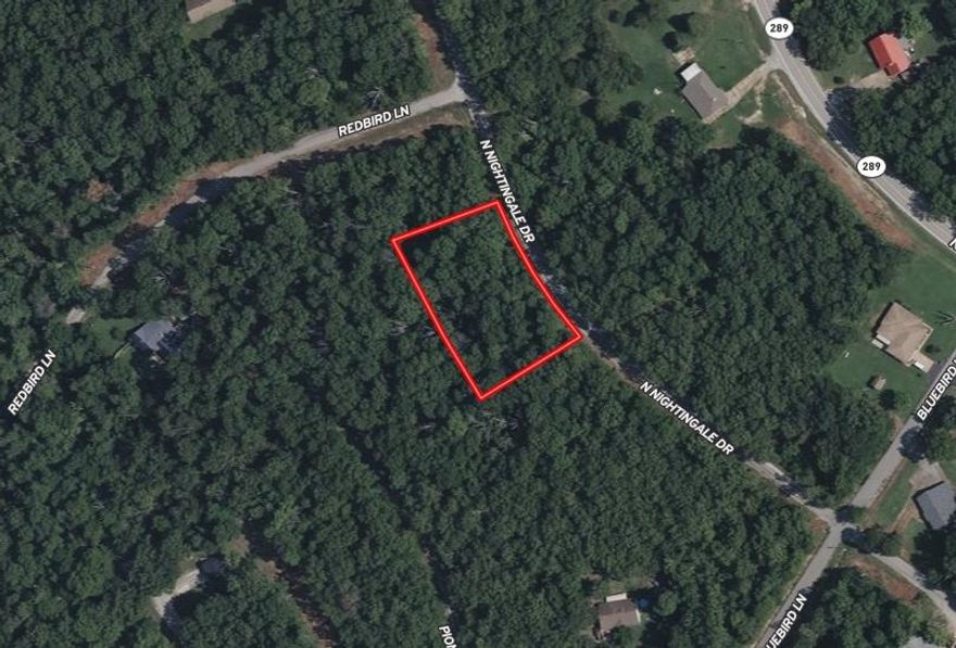 Build your private retreat minutes from town! Stop choosing between privacy and convenience. These two level, beautifully wooded lots offer the perfect setting for your custom home. Totaling 0.77 acre m/l, you'll enjoy the peace of a quiet neighborhood with all the amenities of town just a short drive away. Level Terrain: Minimal site prep-ready for your vision. Total Privacy: Mature trees provide a natural screen and stunning year-round views. Ready for Next Steps: Require state approved perc prior to building. Secure Transfer: Conveyed via Limited Warranty Deed. Don't miss the chance to own a slice of the woods without the long commute. Inquire today for more details!
