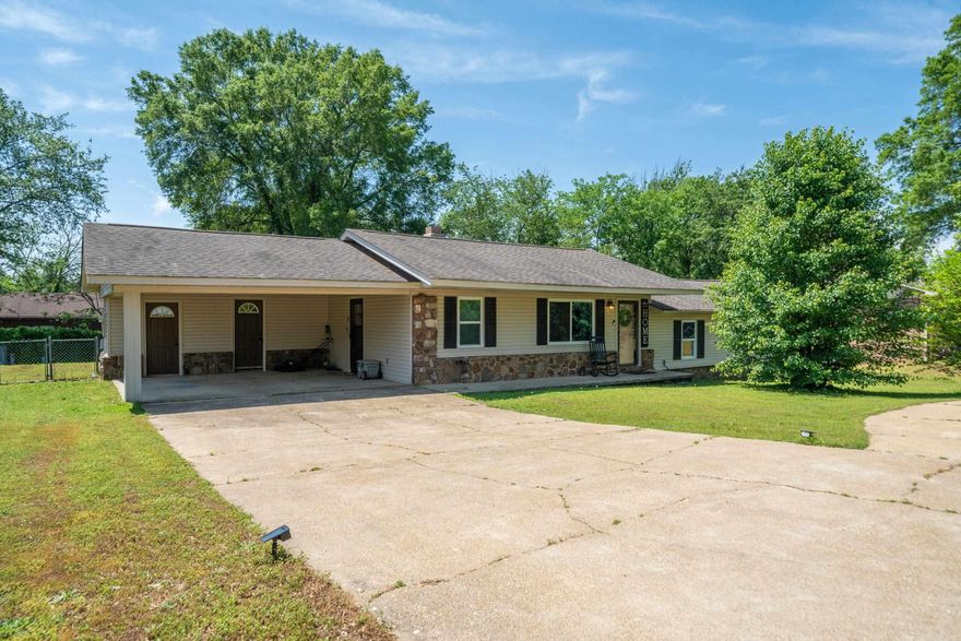 Welcome home! Nice home in cul-de-sac, great neighborhood, three bedroom, two bath, built ins for extra storage, new ceiling fans, new flooring, wood burning fireplace makes it feel cozy and warm, nice laundry and pantry area, screened in porch with deck on back, garden area, nice yard for kids and pets! Carport with storage area. Circle drive for extra parking.Lakeside Schools! Selling as is!