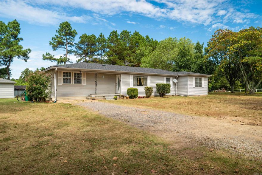 WELCOME TO 131 SILER RD in Bradford, Arkansas 72020—WITH NO RESTRICTIONS! Set on 15.32m/l acres with a pond, this property was built for both comfort and lifestyle. The 4BD/2BA main home (approx. 2,045 sq ft) has been recently remodeled and features new Sheetrock, modern fixtures, a spacious kitchen with abundant cabinets, and a custom quartz island designed for gatherings. The open living room with ambient lighting and a cozy electric fireplace was thoughtfully created to host family and friends, making every celebration feel special. Updates include newer HVAC, shingles, plumbing, and electrical (est. 2 yrs old) for peace of mind. A newly converted 2BD/1BA Mother-In-Law suite (approx. 1,104 sq ft) adds incredible versatility, offering an open concept design, its own new septic tank, and endless possibilities for AirBNB, VRBO, multi-living, or rental income. Step outside to embrace the country lifestyle—outbuildings for storage, a firepit for evenings under the stars, two baby apple trees (one green, one red), and a large Jacuzzi on the back porch create the perfect setting to unwind. This property delivers a rare blend of modern comfort, outdoor living, and endless opportunities.