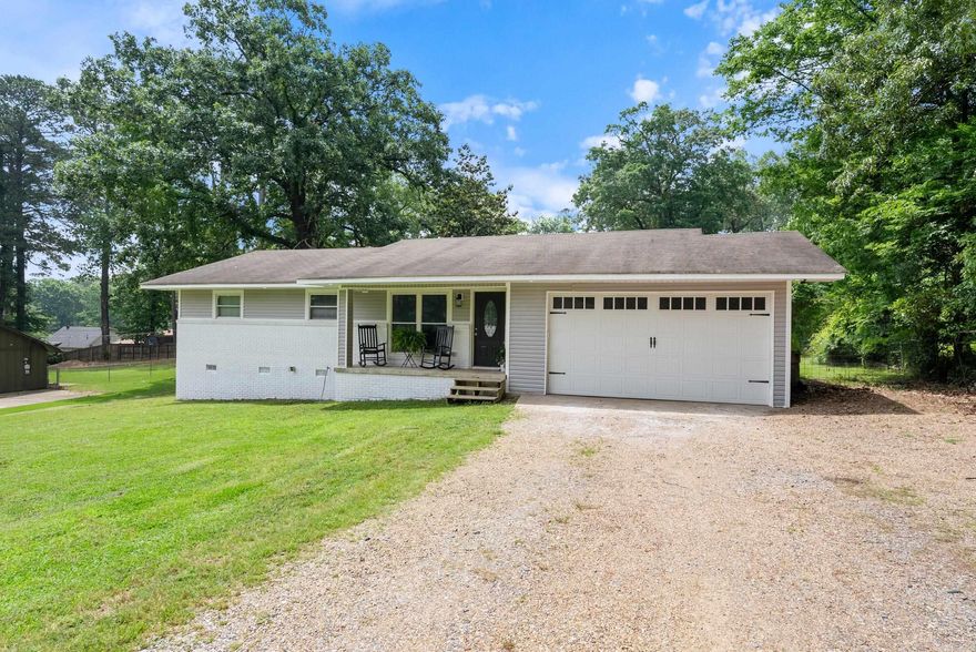 Fully updated and well loved 3-bedroom, 2-bath home in the Beautiful Lakeview subdivision! This charming home is move-in ready with fresh paint, new flooring, updated fixtures, and a newly updated kitchen featuring modern finishes, ample cabinetry, and a gas range. Enjoy the efficiency of a tankless water heater and the convenience of a dedicated laundry room. The spacious primary suite includes a private bath and walk-in closet. Situated on a generous lot, the home offers a fenced backyard and plenty of space in the front and back for outdoor enjoyment. Take in peaceful lake views of the stocked neighborhood lake, with fishing available as a community perk. A two-car garage provides added storage and functionality. Located in the Benton School District with easy access to I-30, shopping, and dining. Don’t miss this opportunity to own a beautifully updated home in one of Benton’s most inviting neighborhoods!