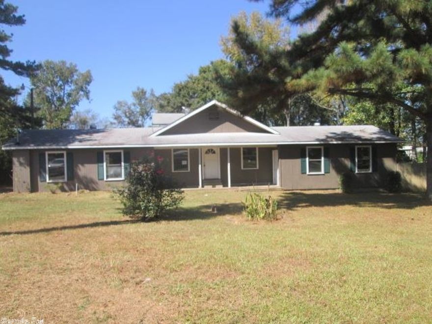 Subject is a split level home with master bedroom and master bath on upper level. Two bedrooms on the lower level. Car storage was enclosed to make a den. Two car garage detached from the home. Large home great for a growing family.