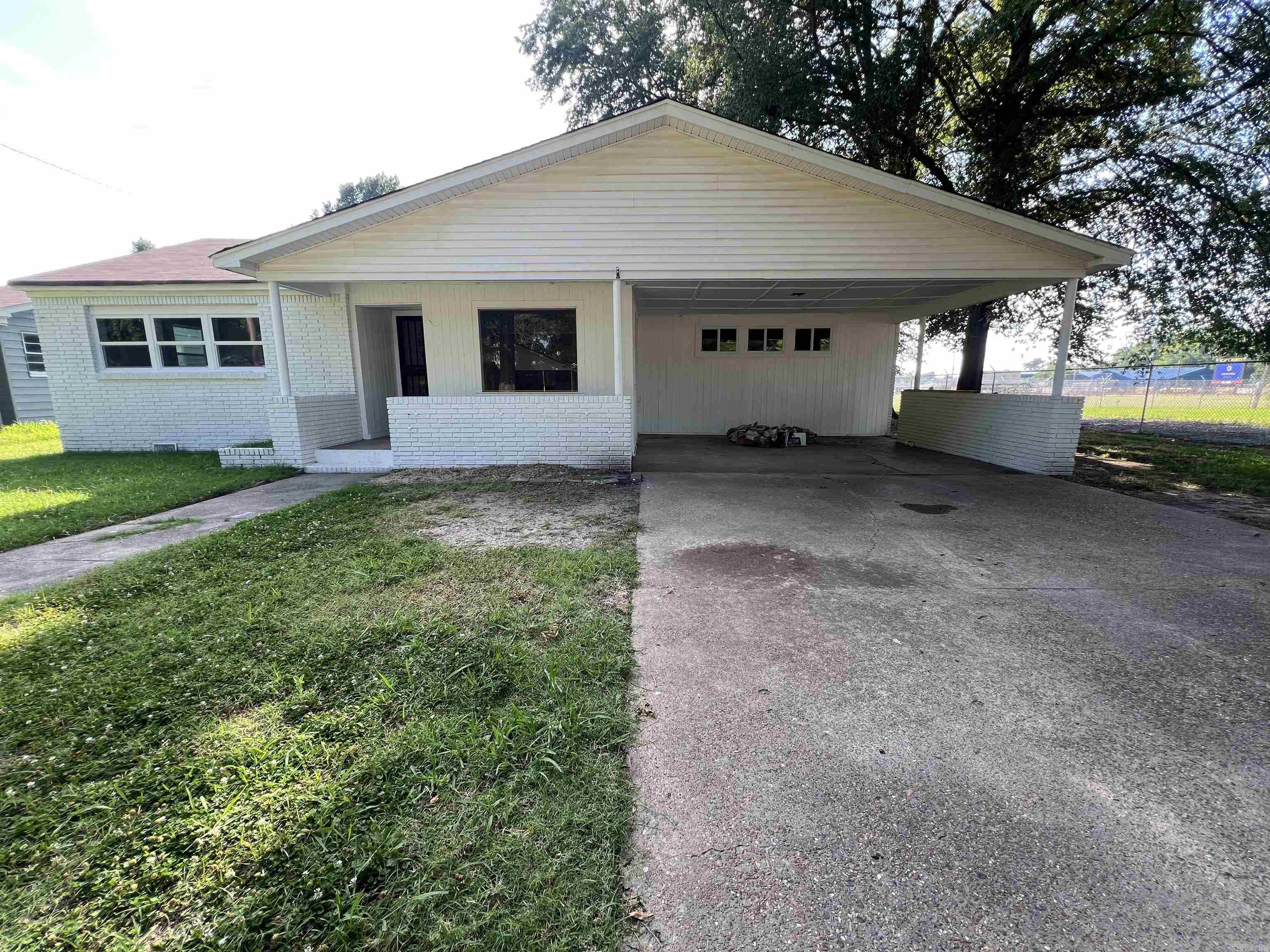 This recently remodeled home is centrally located in town and near the schools. This home offers 3 bedrooms (with potential of a 4th bedroom) and 2 full bathrooms. The bonus room is highlighted by a beautiful new rock fireplace mantel. Recent updates consist of: flooring, kitchen cabinets, countertops, bathtubs/showers, roof, windows (with the exception of the back room) fresh paint throughout the house and the exterior has recently been painted. This home is move in ready with many modern up dates. Call today to schedule a showing.
