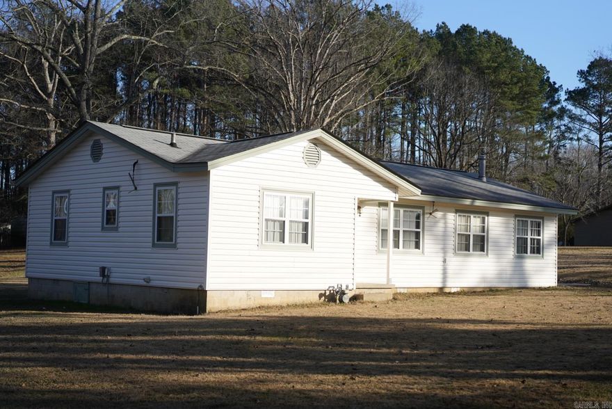 Sitting on approx. 3 acres and out of sight from Hwy 270. You'll find this 3 bed, 1 bath in a quiet area with plenty of room to grow. A 40 foot wide RV Shed to store your RV, Camper, boat or any other toys you wish. A shop sits at the back of the property line with running water and electricity. There are another 2 storage buildings that also have electricity, with the closest one also having running water.