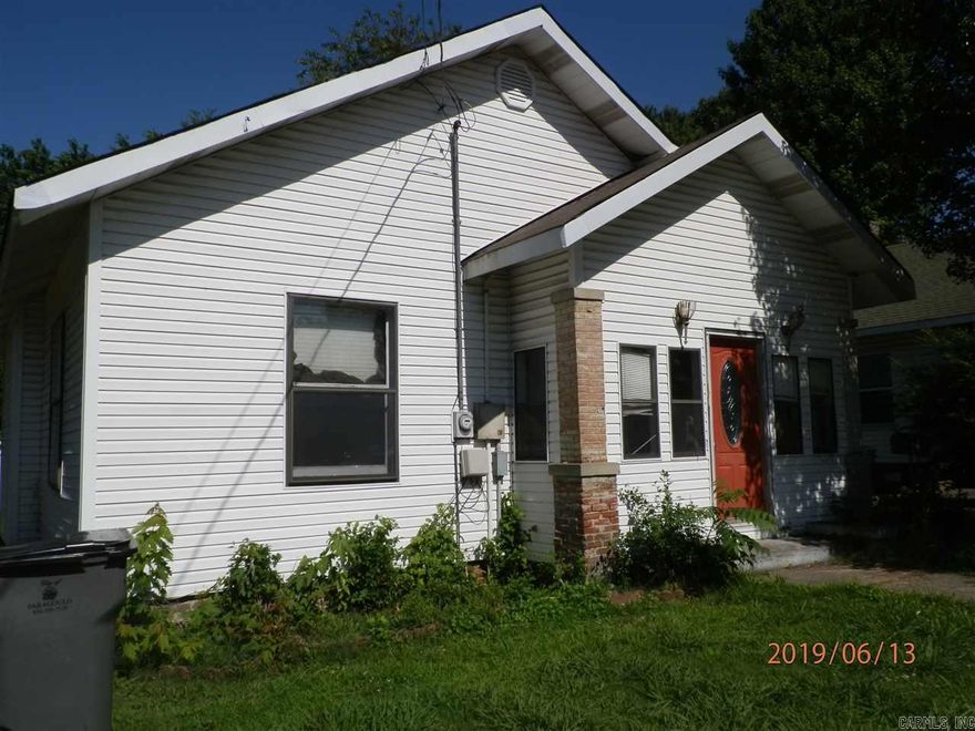 This house has more room than you think. Close to schools, churches and restaurants. Enclosed front porch allows you to be outside without insects and weather. Covered back deck keeps the sun and rain off while enjoying outdoors. Separate dining room has a large picture window. Laundry room has washer/dryer hookups only. Appliances furnished include electric range, refrigerator and dishwasher. Gas central heat. No pets. Not currently approved for Section 8. Application required. Application fee charged.