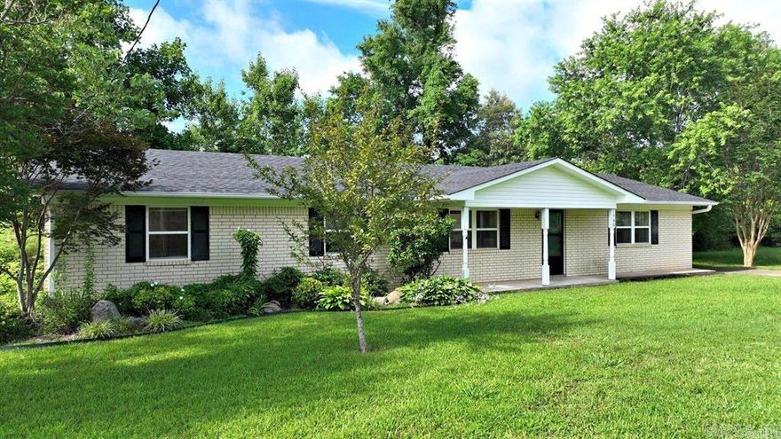 Welcome to your next home! This well-maintained 3 bedroom, 2 full bath brick home is situated on a desirable city lot in a friendly, established neighborhood. Step inside to find spacious living with both a den and a formal living room, perfect for relaxing or entertaining. The large kitchen features abundant cabinet space and connects seamlessly to a dedicated dining room — ideal for holiday dinners and gatherings.  Enjoy the outdoors year-round with a large covered patio, overlooking a fenced backyard and beautifully landscaped surroundings — perfect for pets, outdoor play area, or weekend BBQs!  Additional features include: single carport; detached garage with workshop space — great for hobbies or extra storage; great curb appeal in a well-kept neighborhood.  Don’t miss out on this warm and inviting home — it's a rare find with plenty of space inside and out!  New roof 2025!