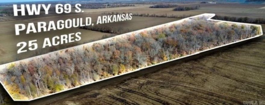 25 acres +/- located on Hwy 69S of Paragould.   Property is two parcels made up of approximately 24 acres wooded and 1 acre pasture.