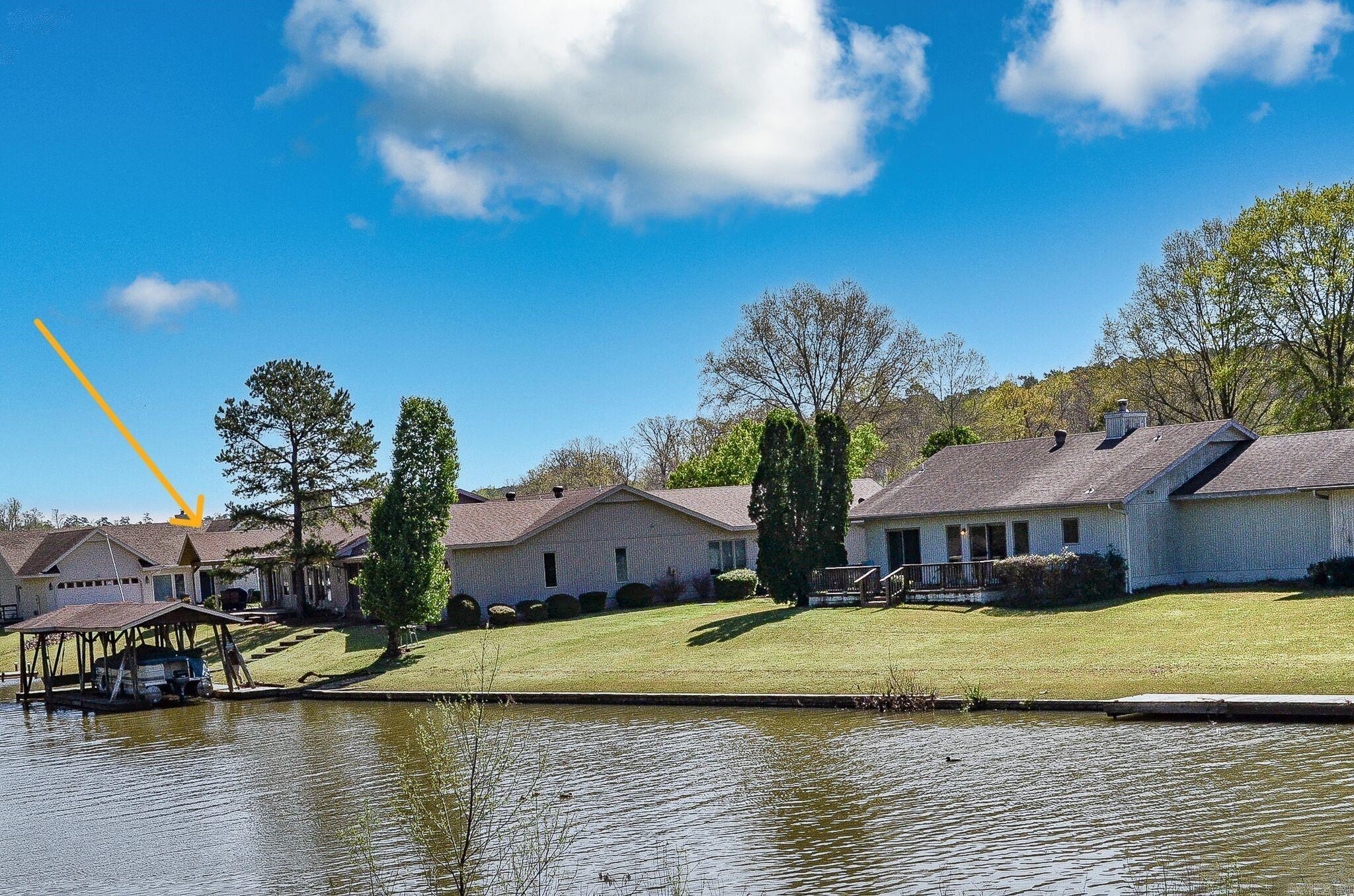 AGENTS SEE REMARKS!! This is it!! Lake Balboa living is right out your back door. This beautifully updated townhouse is only a few steps from the water's edge and private swim dock. One level with split bedrooms, level drive and no yard work!! Move fast as this one will not last at this price!!