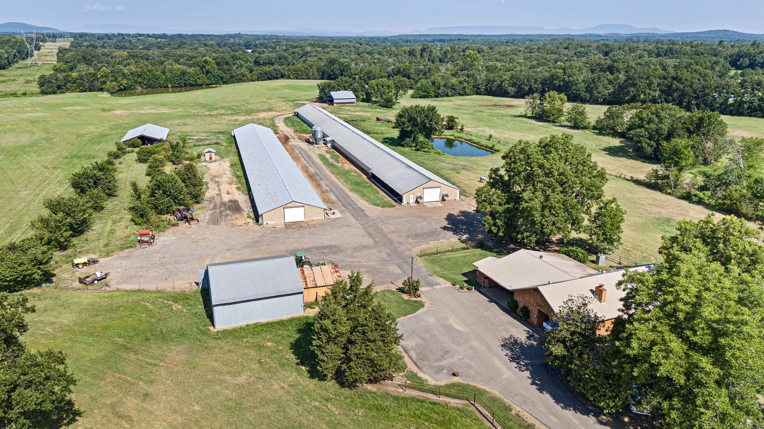 Turn-key Wayne Farms Contracted Poultry Farm on 44± acres in Ola, AR. This income-producing operation includes a beautifully maintained 2,160 sq ft rustic-style home, one active 40āx500ā broiler house under contract with Wayne Farms, and a second 40āx350ā house ideal for hay storage or equipment. A 36āx40ā shop and multiple hay barns add functionality and value. The entire property is fenced and ready for cattle or hay production. Whether youāre a first-time grower or seasoned producer, this well-rounded farm offers the perfect blend of comfort, productivity, and potential.