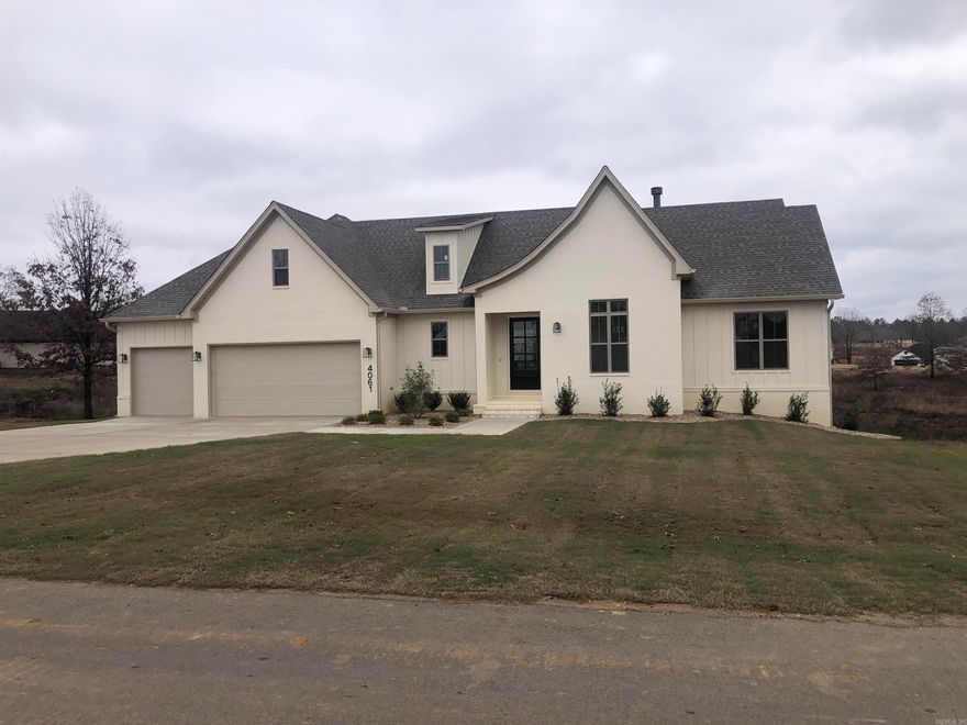 New Construction home - 3 bedroom with office or 4 bedroom. Open floor plan, large covered back porch. 3 car garage! Home also offers finished walk out basement.