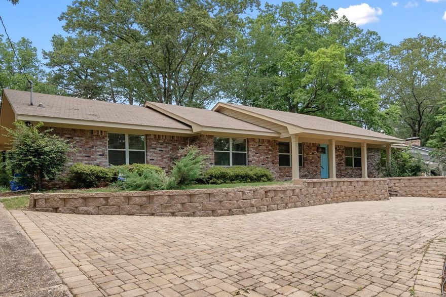 Desirable and convenient Bafanwood property, 3 bedroom, 2 bath, 1,890 sq. ft. features open floorplan, beautiful kitchen with gas range, tile flooring, a bright sun room, and beautiful landscaping.