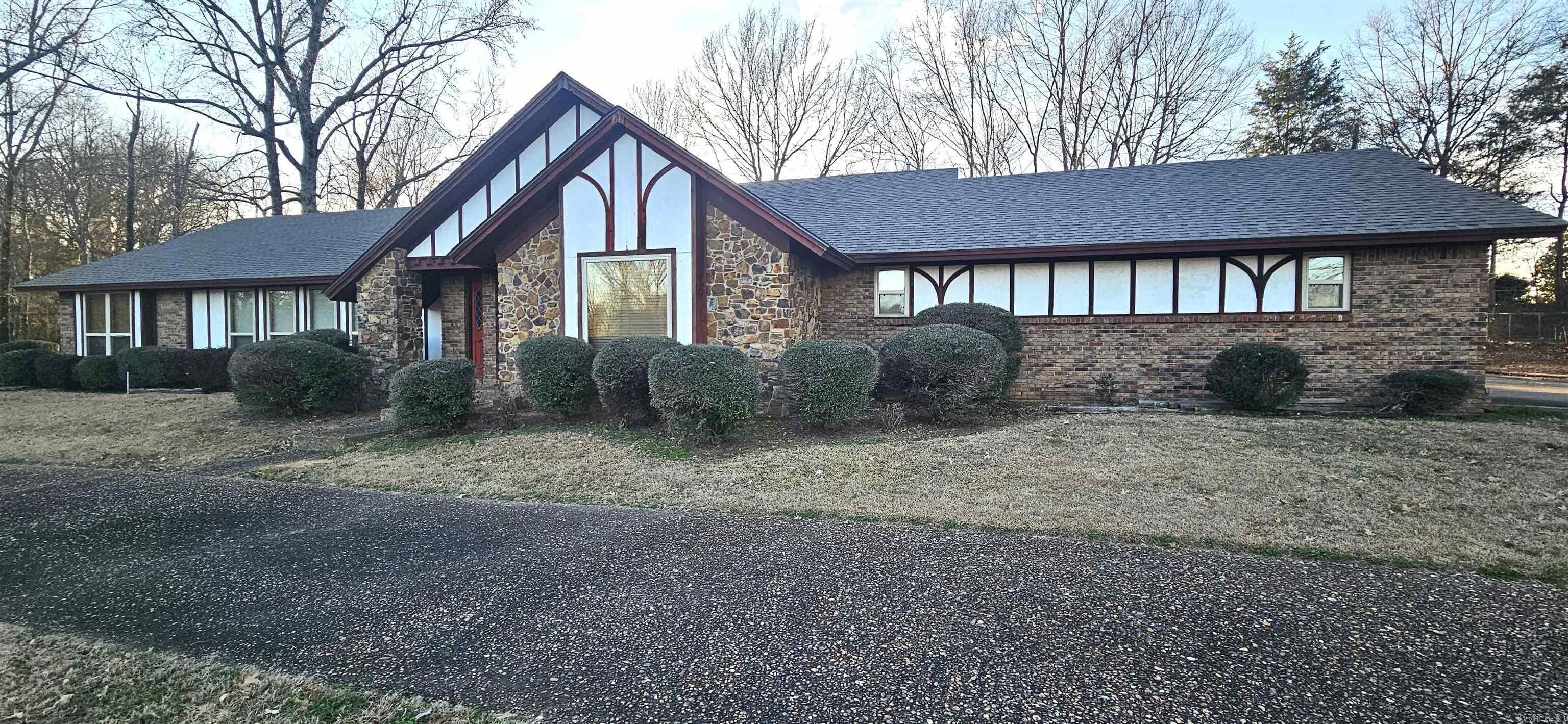 Beautiful Brick Home with 3BR, 2 1/2 Bathroom on 0.52 acres. The Great Room is accented with wood beam ceilings and offers a wood burning fireplace. Kitchen offers plenty of counter and cabinet space. You have a formal Dining area and also a breakfast nook area as well. All the bedrooms are spacious and have large closet space. The Primary Bedroom offer a spacious room with a cozy fireplace (gas logs). The home has e-low glass windows, 2 Car Covered Carport, Circle Driveway and landscaped yard.